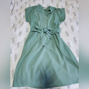 Knee-length green dress